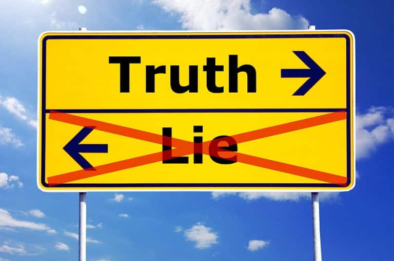 Gaslighting: Street sign showing arrows with Truth pointing to the right and Lie to the left